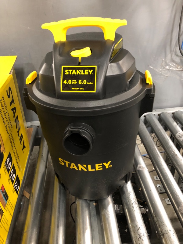 Photo 2 of *** USED *** ** IN LIKE NEW CONDITION ** *** TESTED POWERED ON *** Stanley - SL18116P Wet/Dry Vacuum, 6 Gallon, 4 Horsepower Black