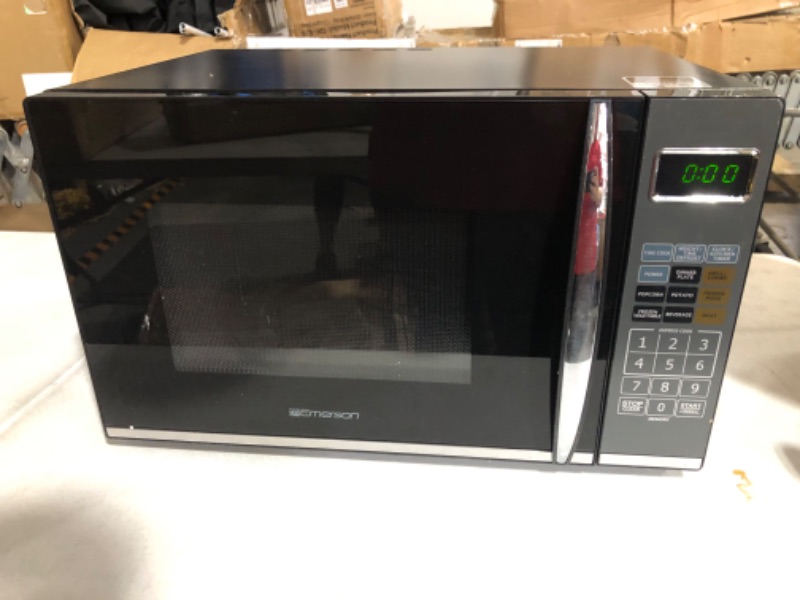 Photo 8 of **See Notes**  
Emerson 1.2 CU. FT. 1100W Griller Microwave Oven with Touch Control