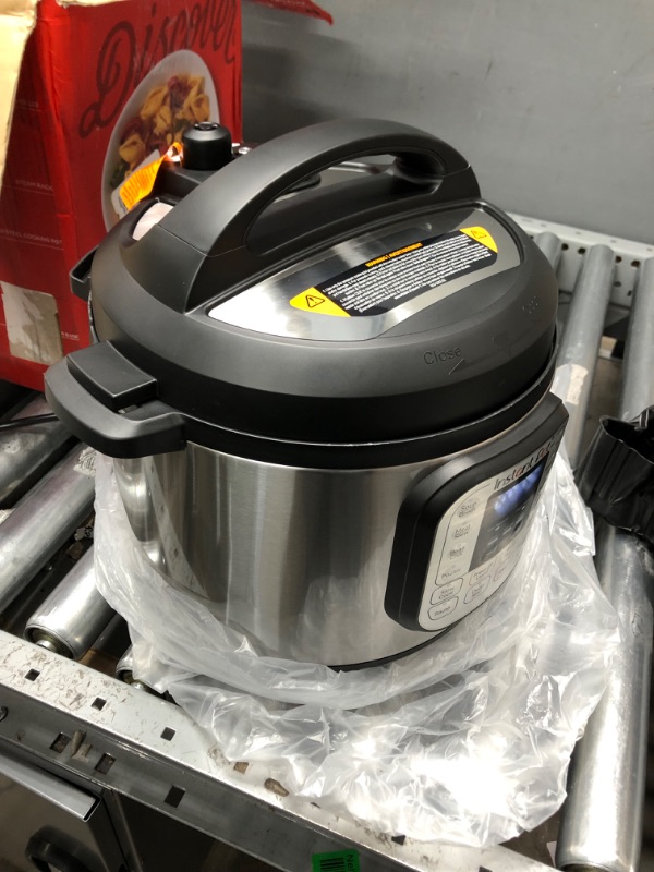 Photo 1 of **DAMAGE**Instant Pot Duo 7-in-1 Electric Pressure Cooker, Slow Cooker, Rice Cooker, Steamer, Sauté, Yogurt Maker, Warmer & Sterilizer, Includes App With Over 800 Recipes, Stainless Steel, 6 Quart 6QT Duo Pressure Cooker