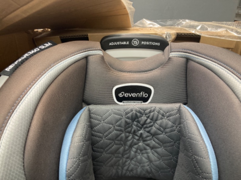 Photo 5 of Evenflo Revolve360 Slim 2-in-1 Rotational Car Seat with Quick Clean Cover (Stow Blue) Revolve Slim Quick Clean Cover Stow Blue