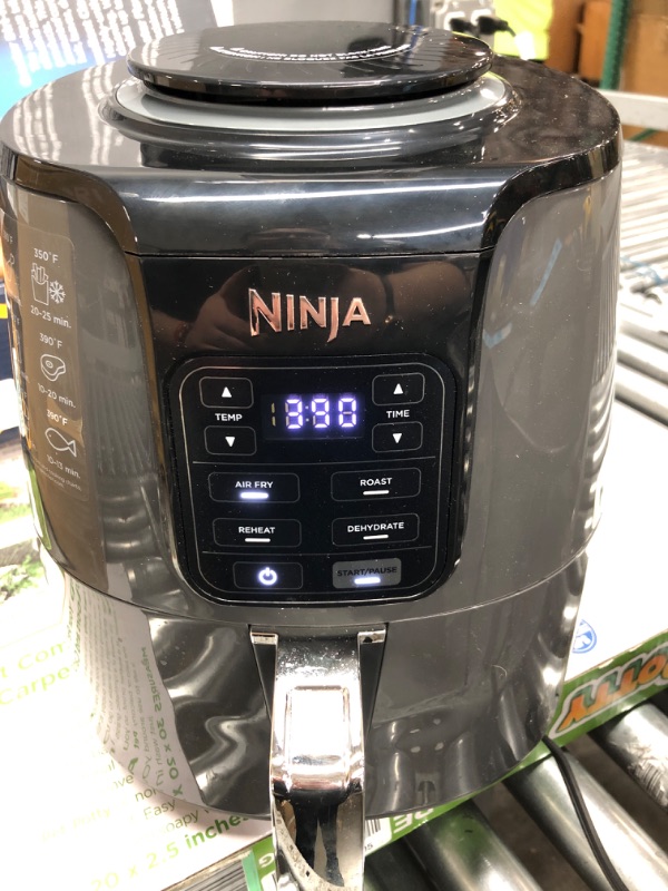 Photo 2 of **SEE NOTES**
Ninja AF101 Air Fryer that Crisps, Roasts, Reheats, & Dehydrates, for Quick, Easy Meals, 4 Quart Capacity, & High Gloss Finish, Black/Grey