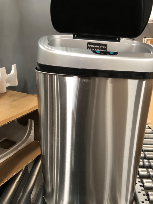 Photo 2 of **READ NOTES** SensorCan 13 Gallon Sensor Trash Can with Wheels and AbsorbX Odor Control System, Stainless Steel, Oval Shape Automatic Kitchen and Office Garbage Bin (Powered by Battery or Optional AC Adapter) Black / Stainless Steel with Wheels