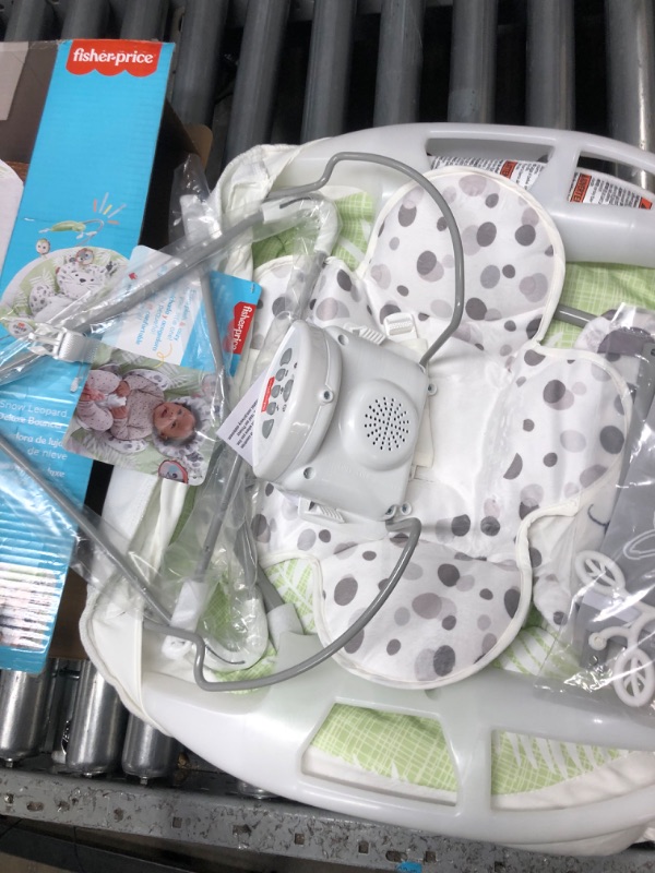 Photo 4 of ?Fisher-Price Snow Leopard Deluxe Bouncer, Bouncing Baby seat with Soothing Music, Sounds, and Vibrations