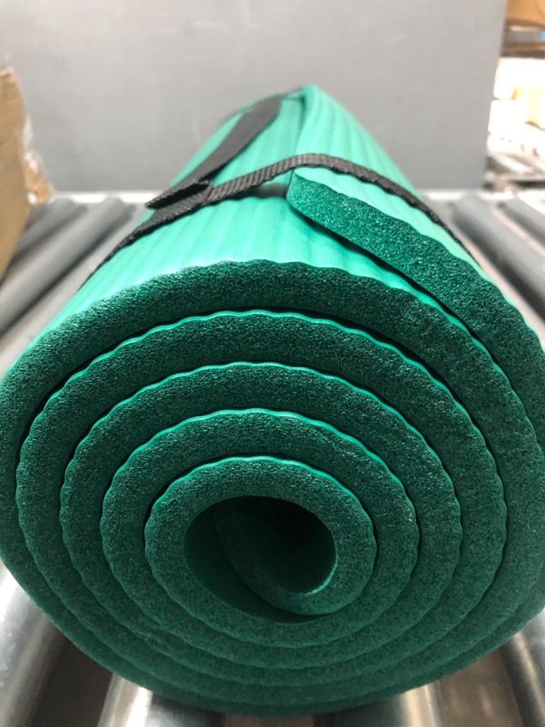 Photo 3 of Gaiam Essentials Thick Yoga Mat Fitness & Exercise Mat with Easy-Cinch Yoga Mat Carrier Strap, 72"L x 24"W x 2/5 Inch Thick
