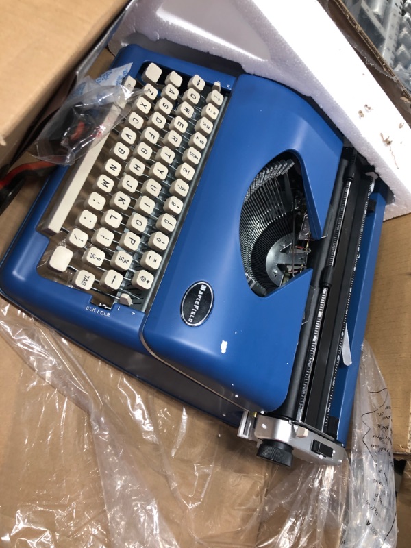 Photo 1 of Blue Vintage Typewriter for a Nostalgic Flow - Manual Typewriter Portable Model for Remote Writing Locations - Sleek & Durable Type Writer Classic Word Processor - Typewriters for Writers