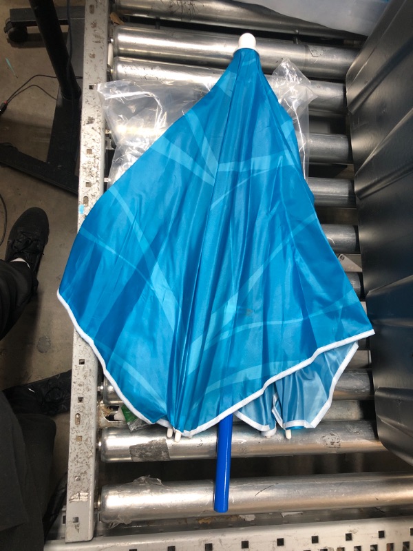 Photo 1 of Small light blue umbrella with no handle