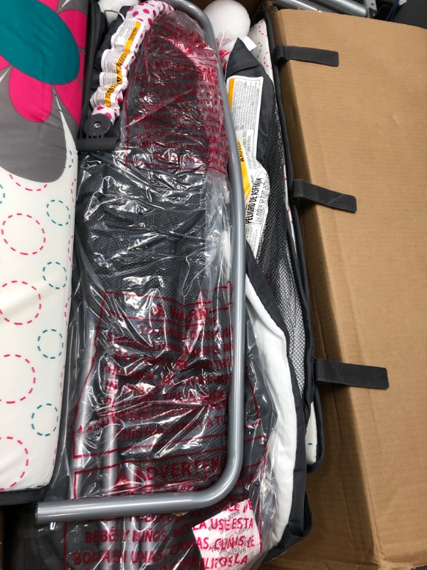Photo 1 of Baby Trend Lil Snooze Deluxe II Nursery Center - Daisy Dots