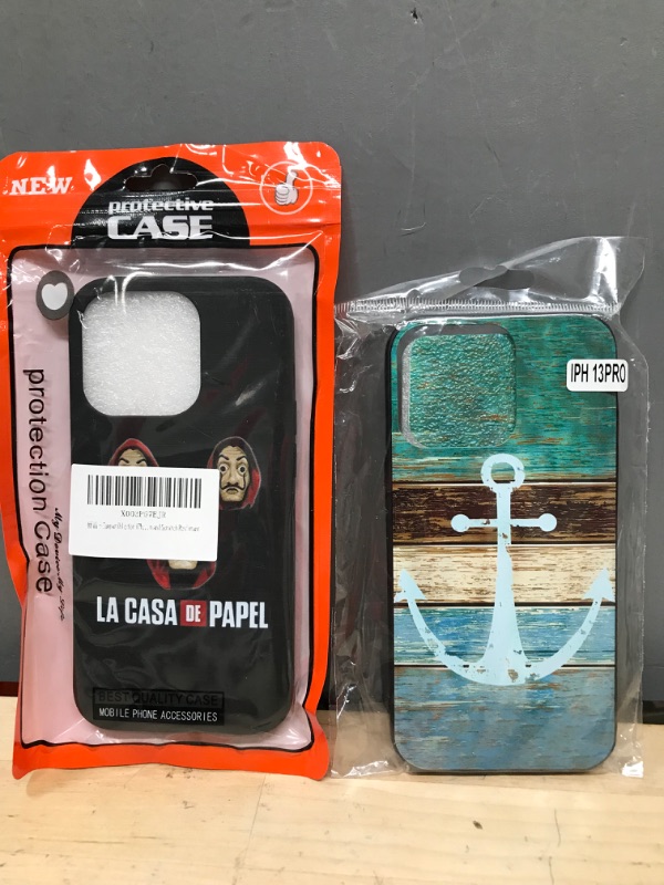 Photo 1 of BUNDLE OF 2 CASES - iPhone 13 Pro Cases, La Casa De Papel and Anchored design 