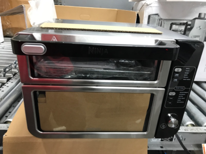 Photo 2 of *POWERS ON* Ninja DCT401 12-in-1 Double Oven with FlexDoor, FlavorSeal & Smart Finish, Rapid Top Oven, Convection and Air Fry Bottom Oven, Bake, Roast, Toast, Air Fry, Pizza and More, Stainless Steel.