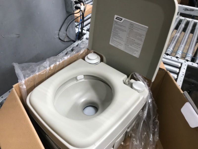 Photo 3 of Camco Portable Travel Toilet | Features Bellow-Type Flush and Sealing Slide Valve to Lock-in Odors and Protect against Leakage | Lightweight and Compact, 2.6 Gallon (41531)