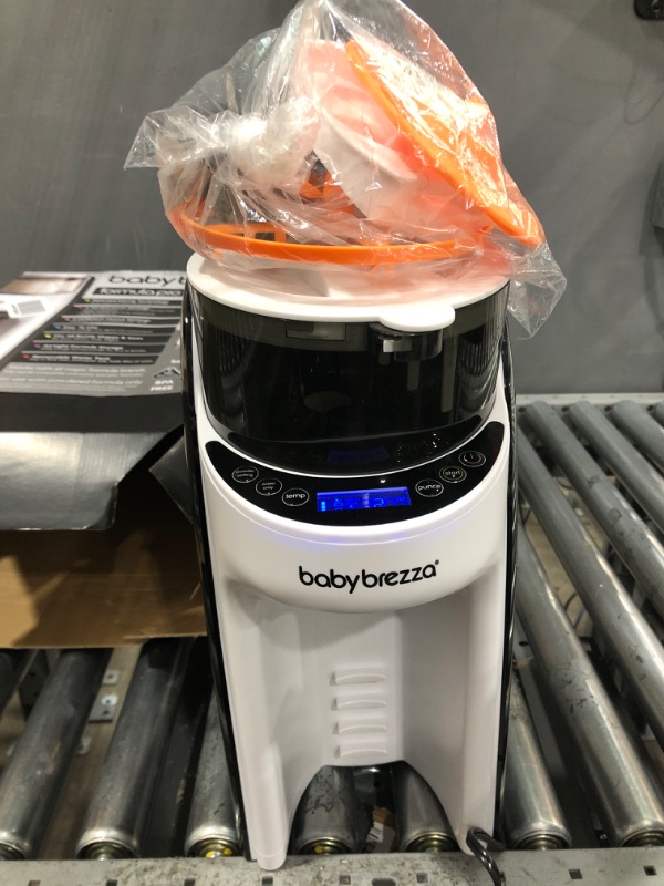 Photo 1 of ***POWERS ON*** New and Improved Baby Brezza Formula Pro Advanced Formula Dispenser Machine - Automatically Mix a Warm Formula Bottle Instantly - Easily Make Bottle with Automatic Powder Blending