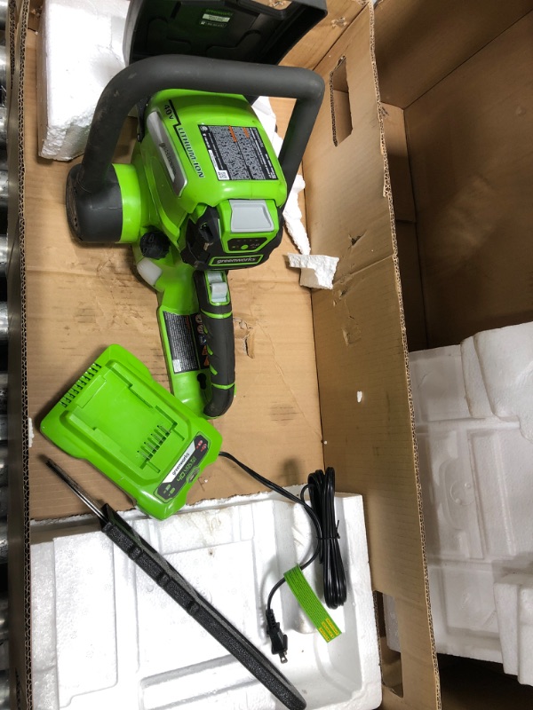 Photo 2 of ***SEE NOTES*** Greenworks 40V 12" Chainsaw, 2.0Ah Battery and Charger Included & Oregon Bar and Chain Oil for Chainsaws, 1 One Quart Bottle (32 fl.oz / 946 ml) (54-026)