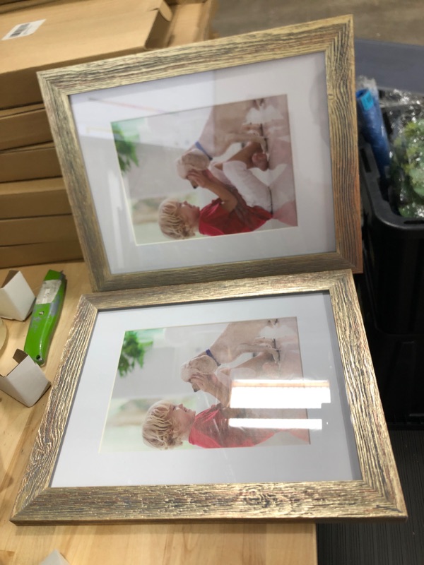 Photo 2 of PEALSN 8.5x11 Picture Frame Set of 2, Made of High Definition Real Glass, Display 6x8 with Mat or 8.5 x 11 Without Mat, Photo Frames for Wall Mounting or Table Top Display, Gold