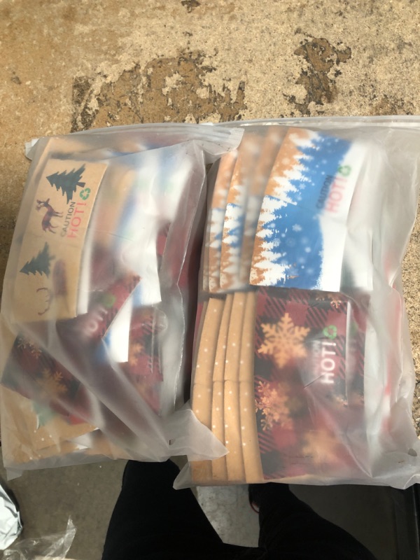 Photo 1 of 2 bags-Christmas Coffee Cup Sleeves Disposable Hot Chocolate Cocoa Paper Cup Sleeve 60 Pack Double-Layer Corrugated Insulated Paper Jacket for 12oz to 20oz Hot Drinks & Cold Beverage, 10 Designs