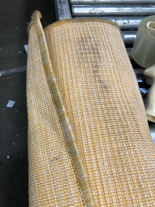 Photo 1 of **DIRTY FROM SHIPPING**GENERIC 6'10" RUG BRIGHT ORANGE