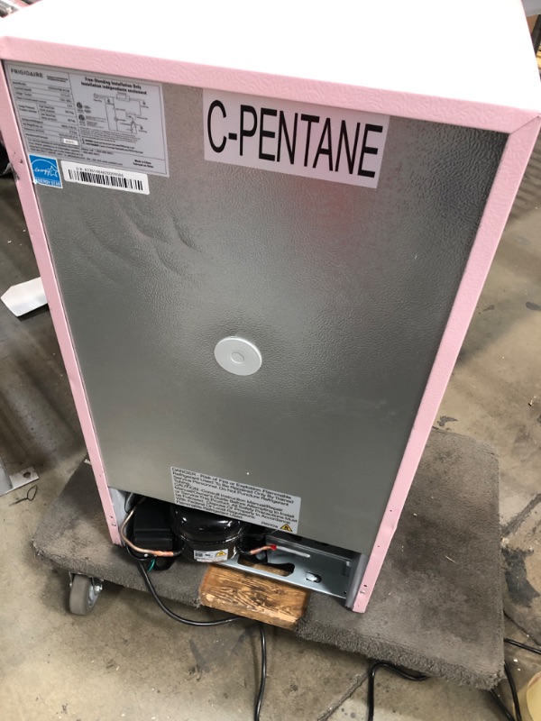 Photo 5 of **COSMETIC DAMAGE**  FRIGIDAIRE EFR376 Retro Bar Fridge Refrigerator with Side Bottle Opener, 3.2 cu. Ft, Pink/Coral PINK Single Door Fridge