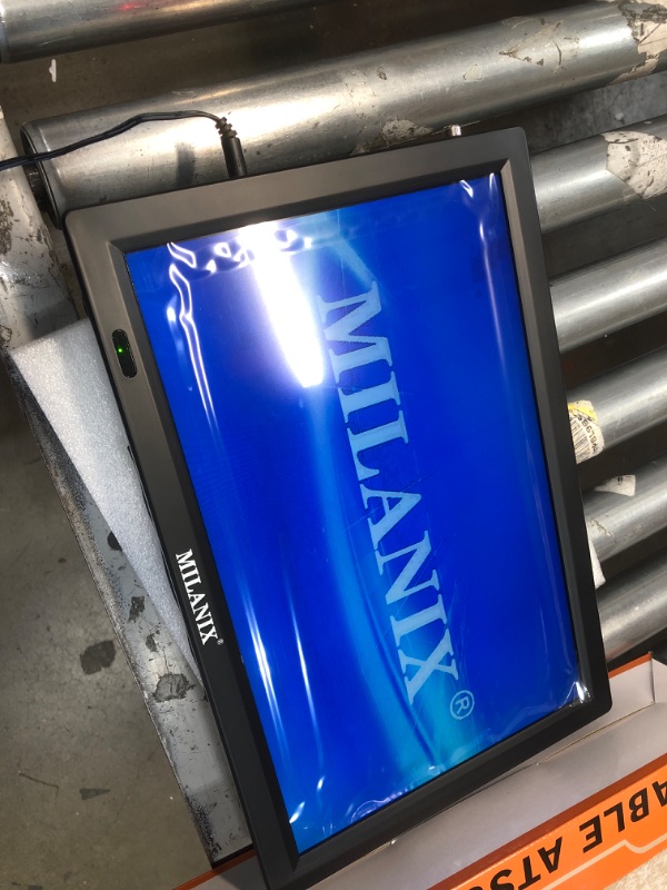 Photo 2 of Milanix 14.1" Portable Widescreen LED TV with HDMI VGA MMC FM Usb/sd Card Slot Built in Digital Tuner AV Inputs and Remote Control