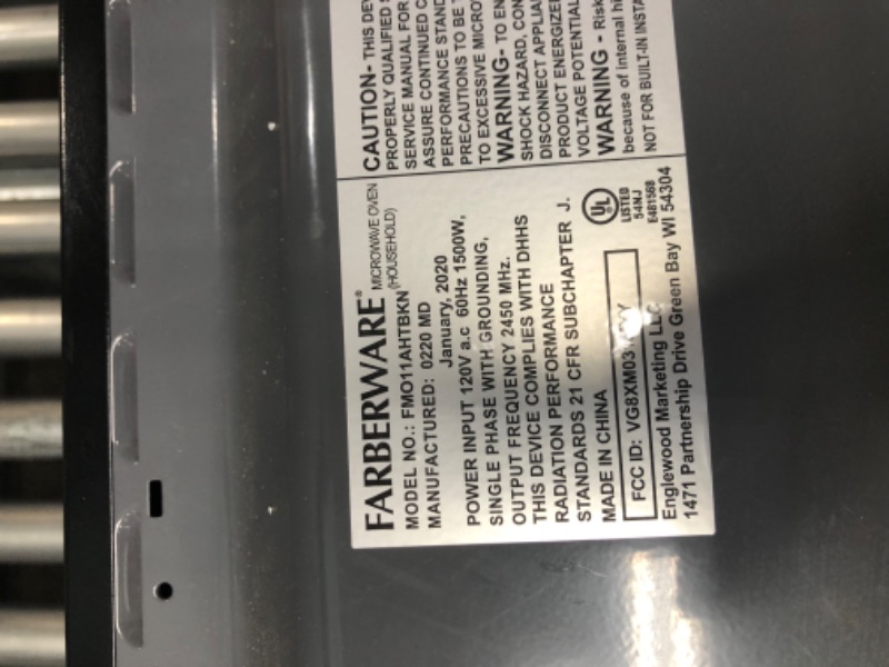 Photo 1 of **MINOR WEAR & TEAR**Farberware Classic FMO11AHTBKN 1.1 Cu. Ft. 1000-Watt Microwave Oven with LED Lighting, Metallic Red