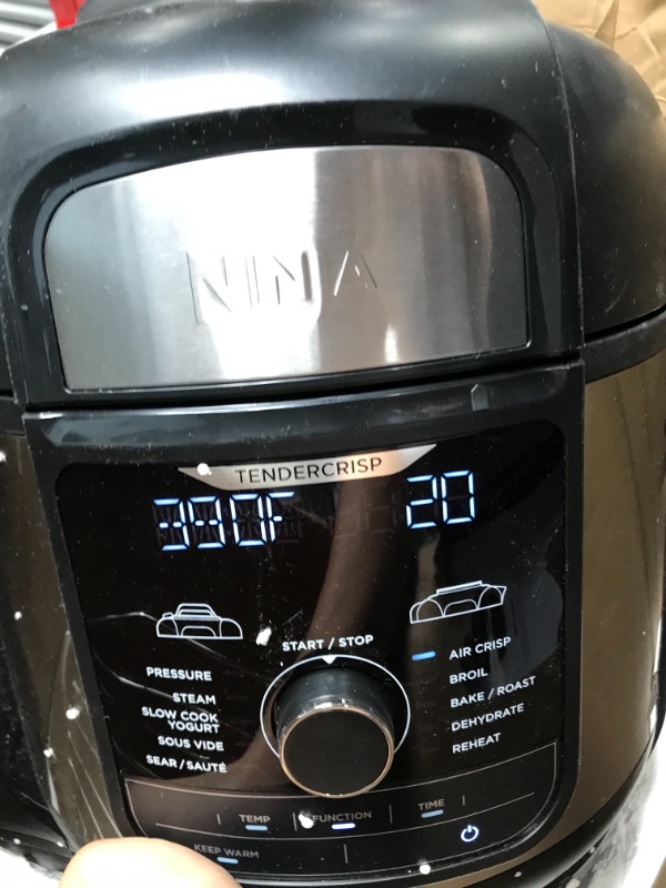 Photo 5 of **ONE HANDLE IS BROKEN**
Ninja FD401 Foodi 12-in-1 Deluxe XL 8 qt. Pressure Cooker & Air Fryer that Steams, Slow Cooks, Sears, Sautés, Dehydrates & More, with 5 qt. Crisper Basket, Deluxe Reversible Rack & Recipe Book, Silver 8 Quart 8-Quart/Stainless Ste