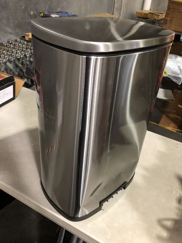 Photo 2 of **ITEM IS DENTED AND lever is broken***
 SoftStep 13.2 Gallon Step Trash Can with Odor Filter System, Stainless Steel 50 Liter Pedal Garbage Bin 