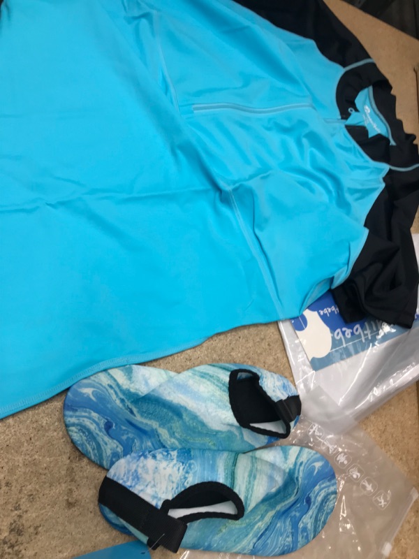 Photo 1 of Swimming shoes  (size 5) and shirt (size 3XL)