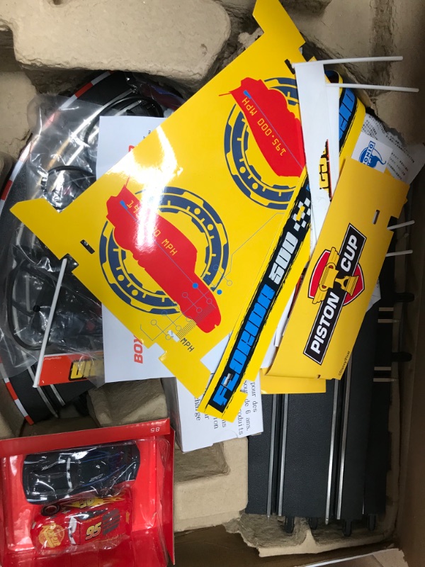 Photo 2 of Carrera GO!!! 62477 Disney Pixar Cars Neon Nights Electric Slot Car Racing Kids Toy Race Track Set Includes 2 Controllers and 2 Cars in 1:43 Scale Disney Cars Neon