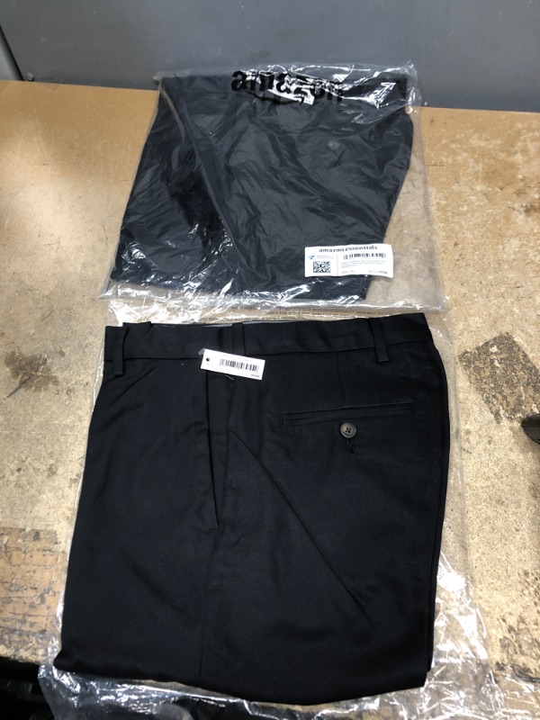 Photo 2 of  2 pairs Amazon Essentials Men's Classic-Fit Expandable-Waist Flat-Front Dress Pant Polyester Black 29W x 34L