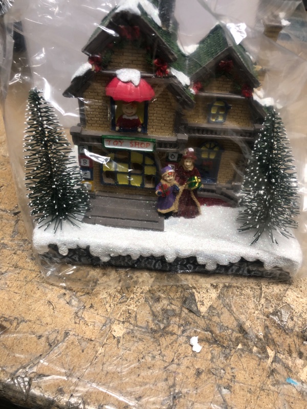 Photo 2 of 7'' Christmas Village Decoration, Christmas Village Toy House with Lights, Resin Christmas Scene Collectible Building, for Christmas Table Decoration