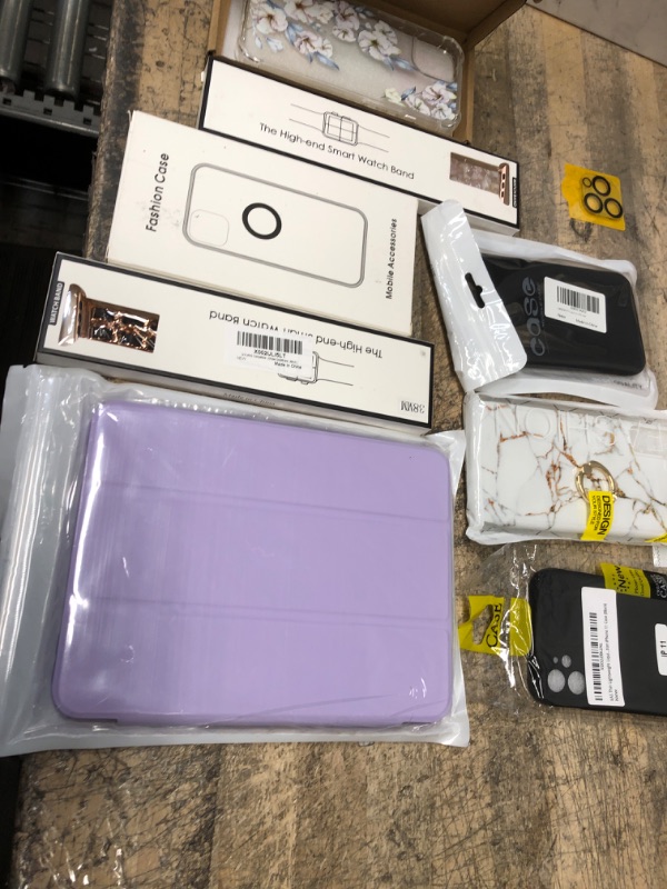 Photo 1 of BUNDLE OF 8 ASSORTED PHONE CASES/ APPLE WATCH WRIST BANDS, ETC.