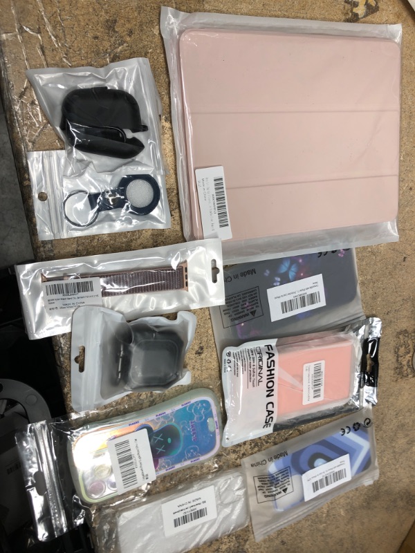 Photo 1 of bundle of 10 assorted phone case, airpod cases, apple watch wrist bands, etc
