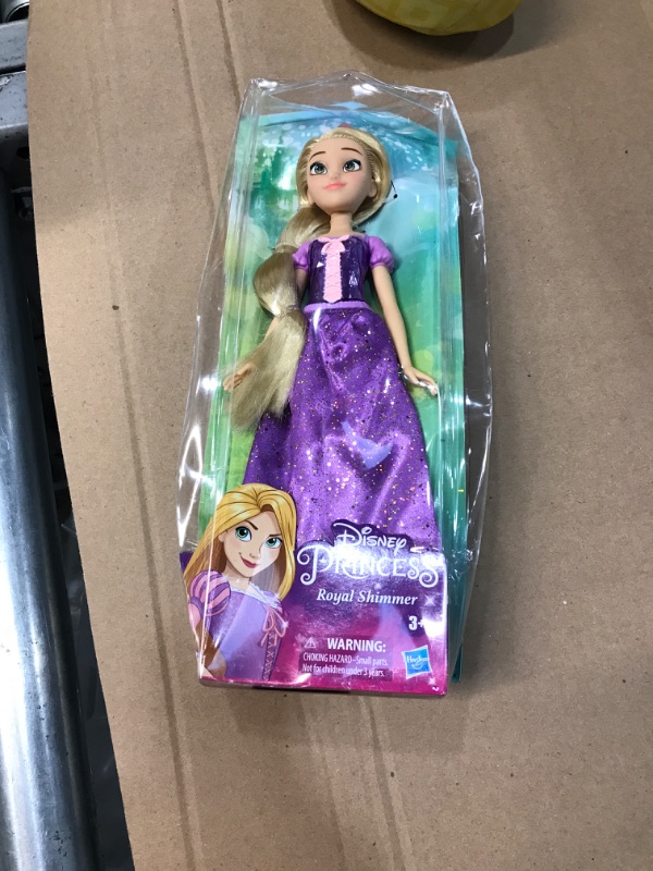 Photo 2 of Disney Princess Royal Shimmer Rapunzel Doll, Fashion Doll with Skirt and Accessories, Toy for Kids Ages 3 and Up Character