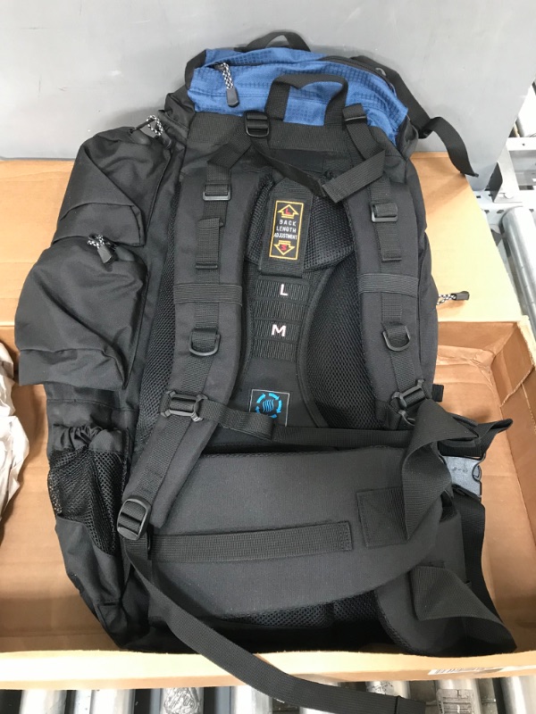 Photo 4 of  ETON Sports Explorer Backpack Full Internal Frame - Adjustable Backpacking Travel Gear - Water-Repellant Rainfly Cover, Sleeping Bag & 3-Liter Hydration Bladder Pack Storage - Ocean, 75L