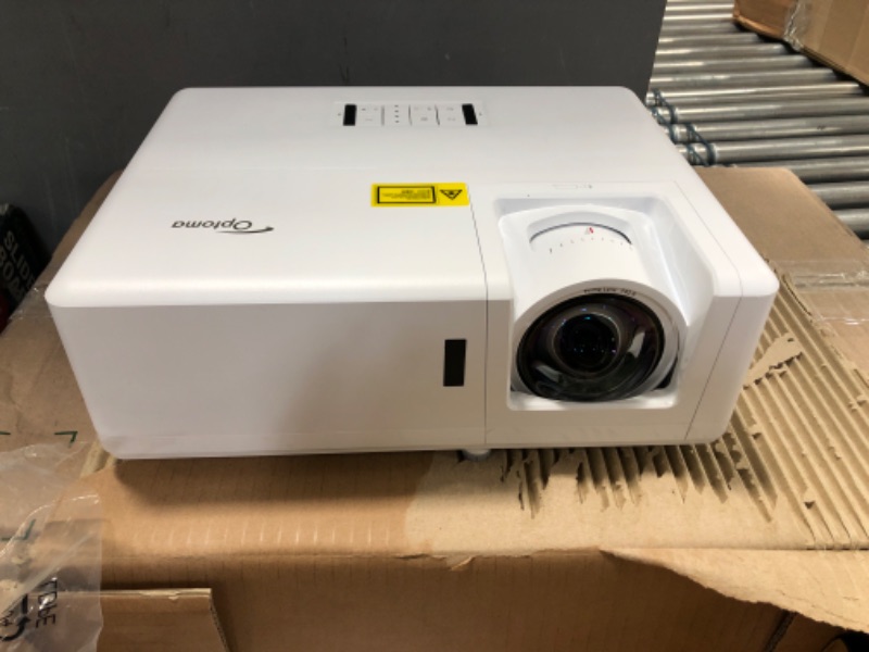 Photo 2 of Optoma GT1090HDR Short Throw Laser Home Theater Projector | 4K HDR Input | Reliable Lamp-Free Operation 30,000 Hours | Bright 4,200 Lumens for Day and Night Viewing