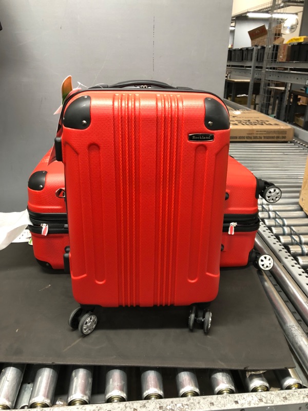 Photo 4 of Rockland 3-Piece Expandable Hardside Spinner Luggage Set (Red) (20/24/28)
