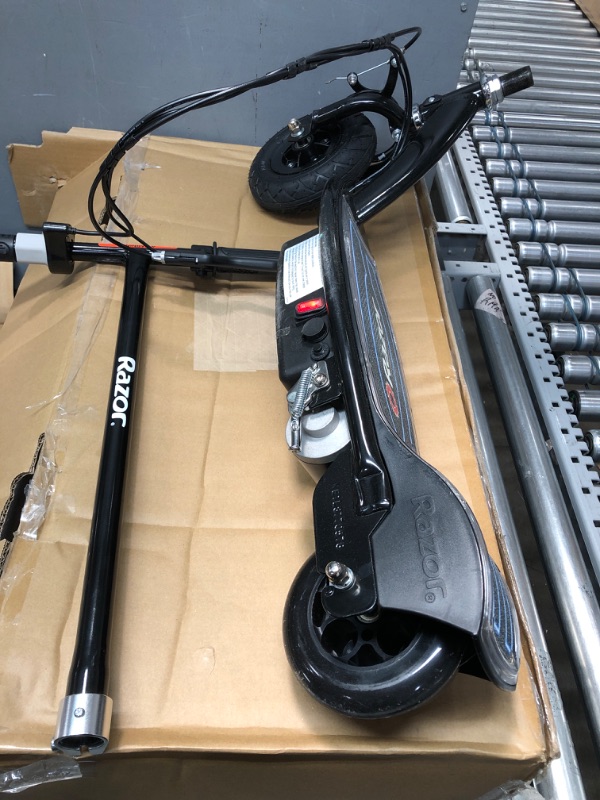 Photo 1 of **PARTS ONLY**
Razor E100 Electric Scooter - 8" Pneumatic Front Tire, Hand-Operated Front Brake