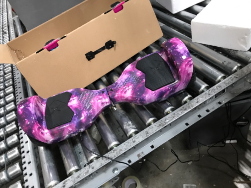 Photo 4 of *** FOR PARTS ONLY*** Hover-1 Helix Electric Hoverboard | 7MPH Top Speed, 4 Mile Range, 6HR Full-Charge, Built-in Bluetooth Speaker, Rider Modes: Beginner to Expert Hoverboard Galaxy DOES NOT WORK CHARGER IS CONNECTED BUT DOES NOT GIVE POWER  