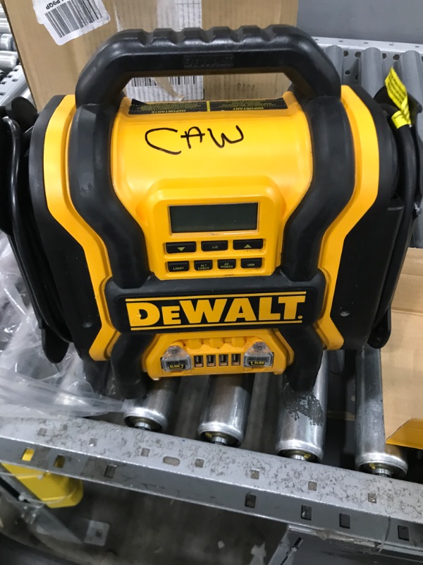 Photo 2 of DEWALT DXAEPS14 1600 Peak Battery Amp 12V Automotive Jump Starter/Power Station with 500 Watt AC Power Inverter, 120 PSI Digital Compressor, and USB Power , Yellow