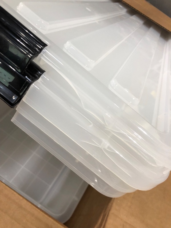 Photo 6 of **damaged lids**
IRIS USA 91 Quart Large Storage Bin Utility Tote Organizing Container Box with Buckle Down Lid for Clothes Storage, 4 Pack, Clear, Clear/Black (500184) h) 91 Qt. - 4 Pack