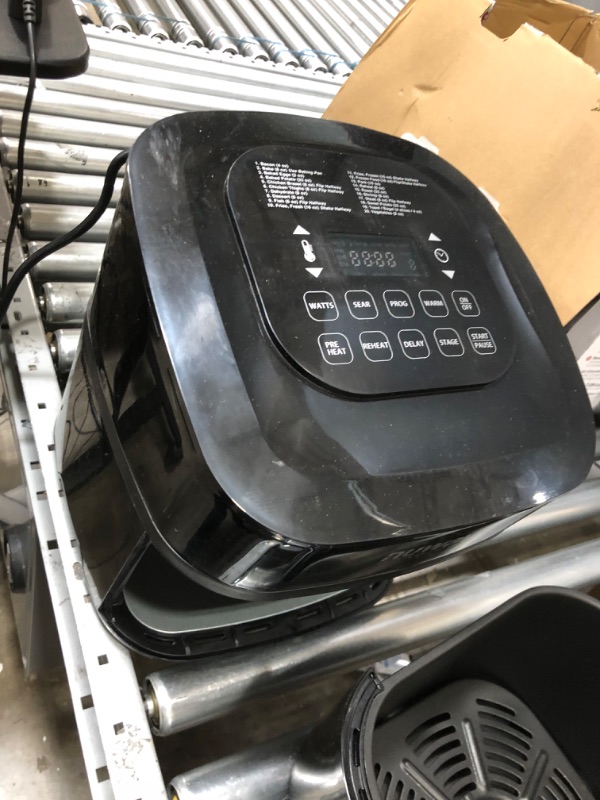 Photo 4 of **used item**
Nu Wave Brio 7-in-1 Air Fryer Oven, 7.25-Qt with One-Touch Digital Controls, 50°- 400°F Temperature Controls in 5° Increments, Linear Thermal (Linear T) for Perfect Results, Black 7.25QT Brio