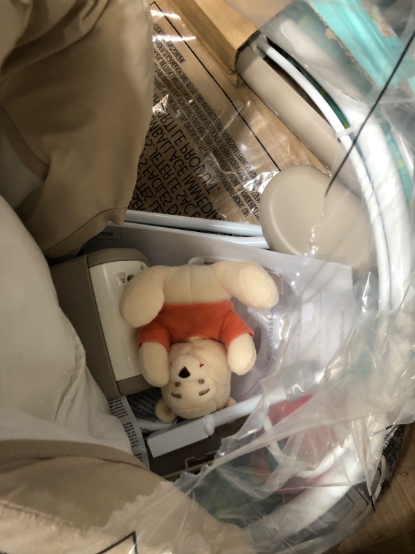 Photo 4 of **box has been opened**
Bright Starts Winnie the Pooh Dots & Hunny Pots Baby Bouncer with Vibrating Infant Seat, Music & 3 Playtime Toys, 23x19x23 Inch