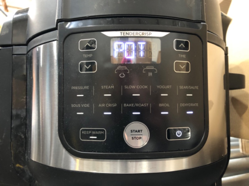 Photo 2 of Ninja FD302 Foodi 11-in-1 Pro 6.5 qt. Pressure Cooker & Air Fryer that Steams, Slow Cooks, Sears, Sautés, Dehydrates & More, with 4.6 qt. Crisper Plate, Nesting Broil Rack & Recipe Book, Silver/Black