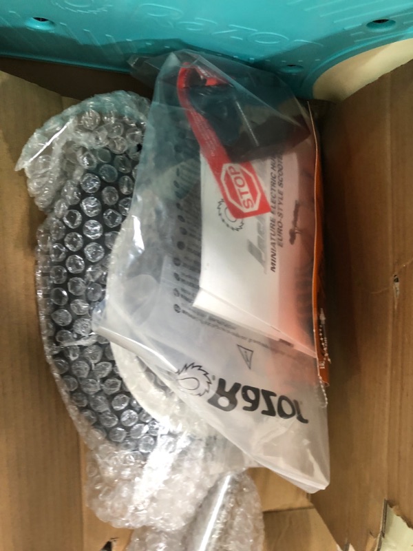 Photo 1 of Razor Pocket Mod Petite - 12V Miniature Euro-Style Electric Scooter for Ages 7+, 100-watt Motor, Up to 40 min Ride Time, For Riders up to 110 lbs