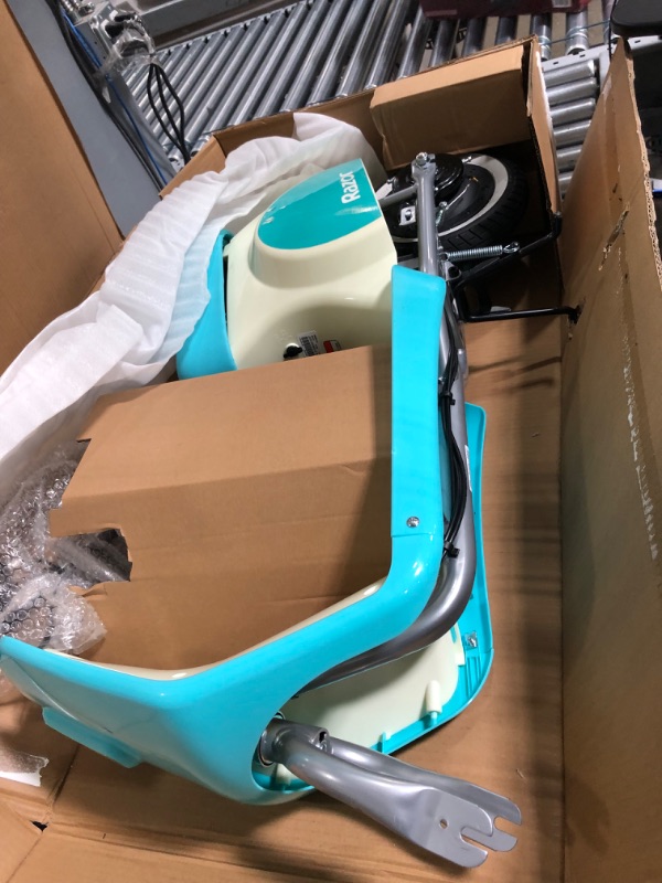 Photo 1 of Razor Pocket Mod Petite - 12V Miniature Euro-Style Electric Scooter for Ages 7+, 100-watt Motor, Up to 40 min Ride Time, For Riders up to 110 lbs