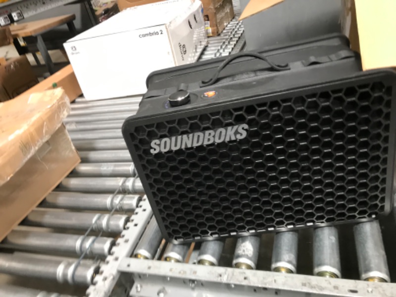 Photo 8 of SOUNDBOKS Go - Loud Portable Bluetooth Performance Speaker (121 dB, Small, Wireless, Powerful Bass, 40Hr Runtime, Swappable Battery, Outdoor, Party, Mini Boombox, Subwoofer, Splashproof)