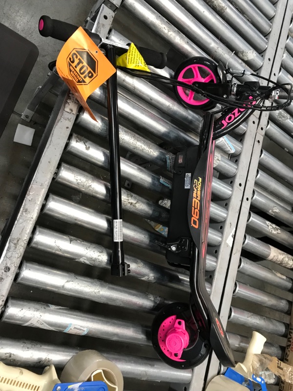 Photo 2 of PARTS ONLKY DOES NOT HAVE POWER TO MOTOR 
Razor Power Core E90 Electric Scooter - Hub Motor, Up to 10 mph and 80 min Ride Time, for Kids 8 and Up Pink Standard Packaging