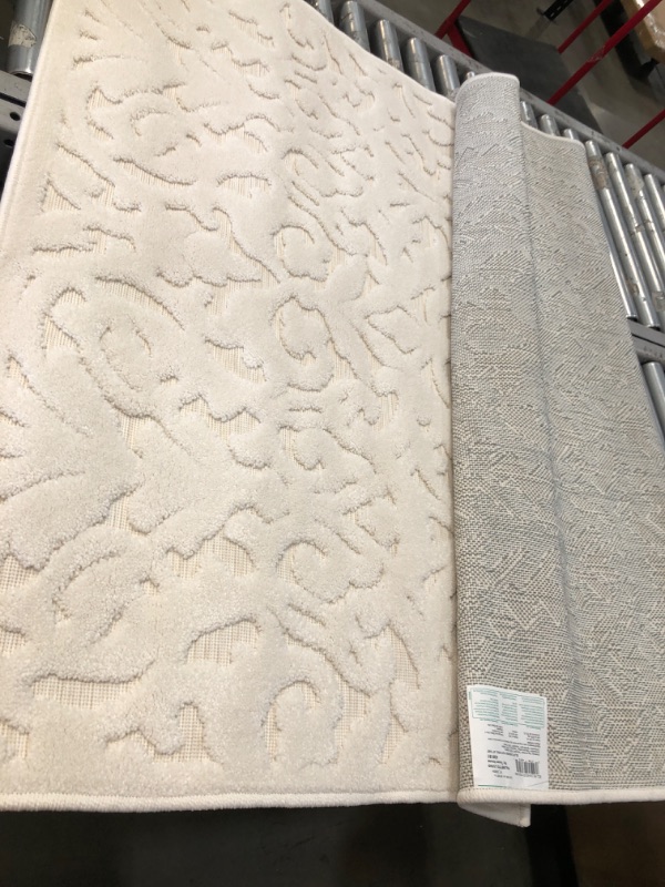 Photo 1 of **USED** 47"x65" White Decorative Rug