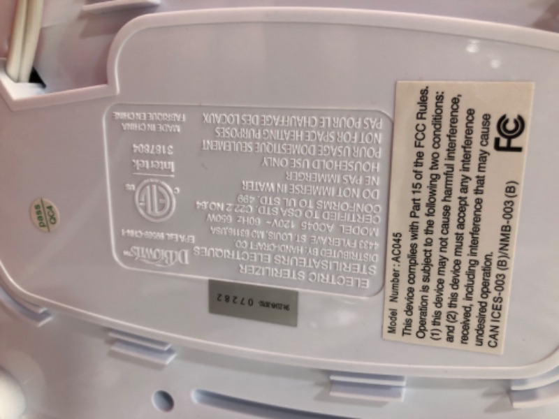 Photo 4 of **USED/POSSIBLE MISSING INSERTS** Dr. Brown's Deluxe Electric Baby Bottle and Pacifier Sterilizer Deluxe Sterilizer