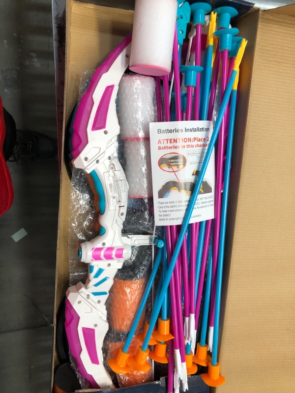 Photo 2 of **USED/POSSIBLE MISSING PIECES** JOYIN 2 Pack Graviton Bow and Arrow Archery Toy Set for Kids, Light Up Archery Play Set with 2 Luminous Bows, 18 Suction Cups Arrows, 8 Targets, and 2 Quivers (Black White)