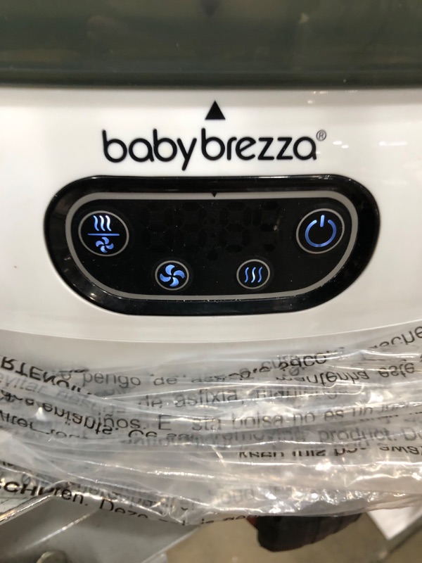 Photo 2 of Baby Brezza Baby Bottle Sterilizer and Dryer Advanced – Electric Steam Sterilization Machine – Universal Sterilizing for All Bottles: Plastic + Glass + Pacifiers + Breast Pump Parts - HEPA Filtration