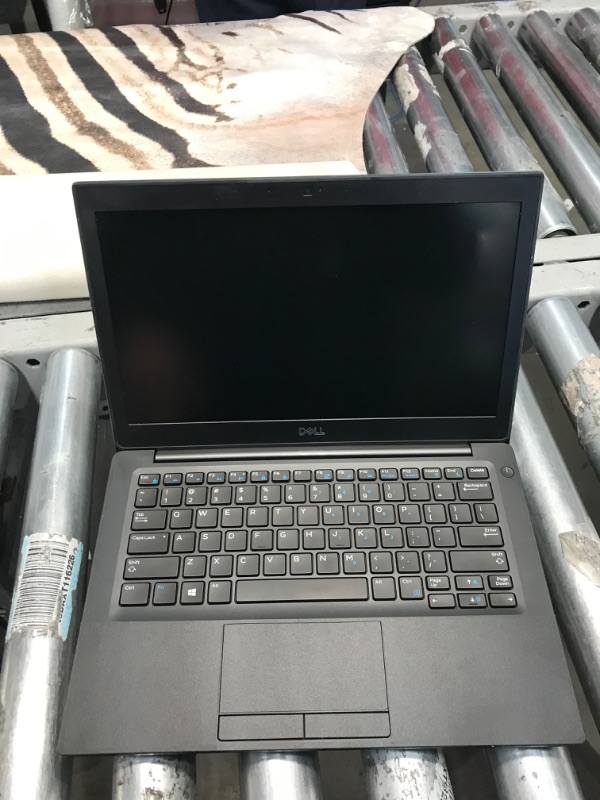 Photo 2 of PARTS ONLY DID NOT POWER ON 
Dell Latitude 7290 12.5 HD Business Laptop, Intel Core i5-8350U, 256GB SSD, 16GB DDR4, Webcam, Bluetooth, Windows 10 Pro (Renewed)
